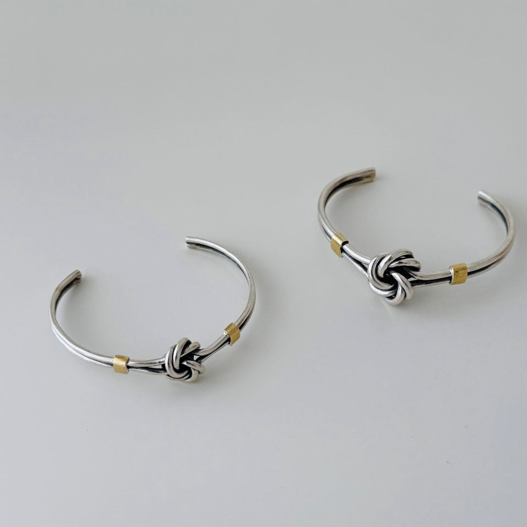 Escrava de nó com ouro