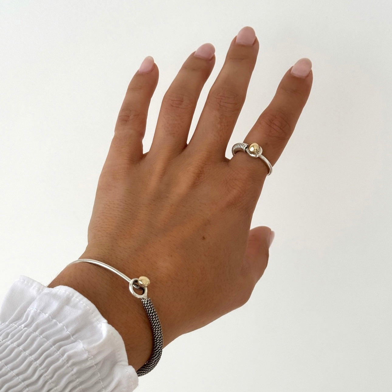 Pulseira entrançada com pepita de ouro