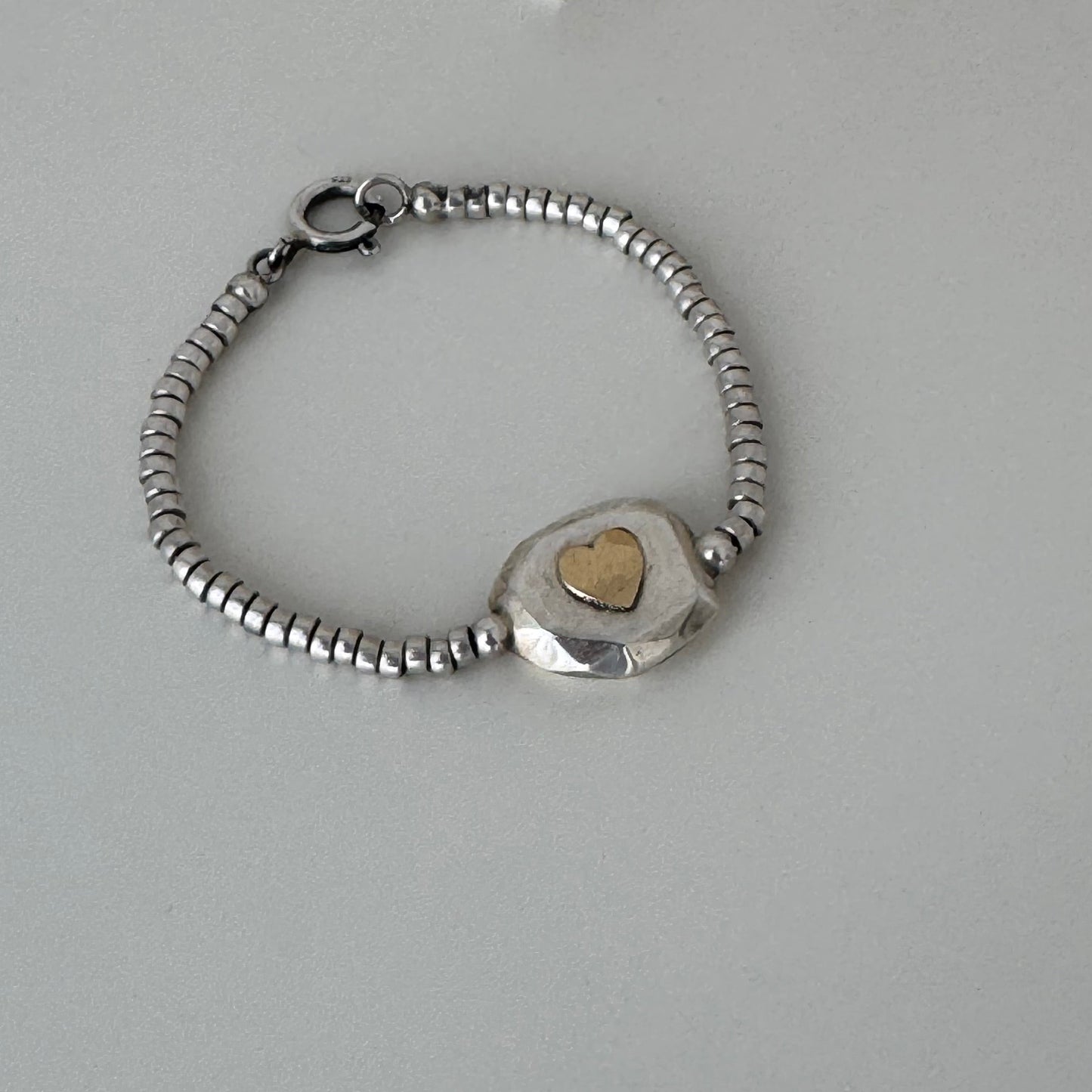 Pulseira com coração em ouro