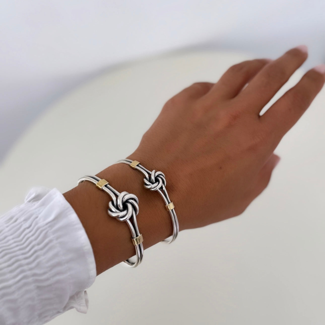 Escrava de nó com ouro