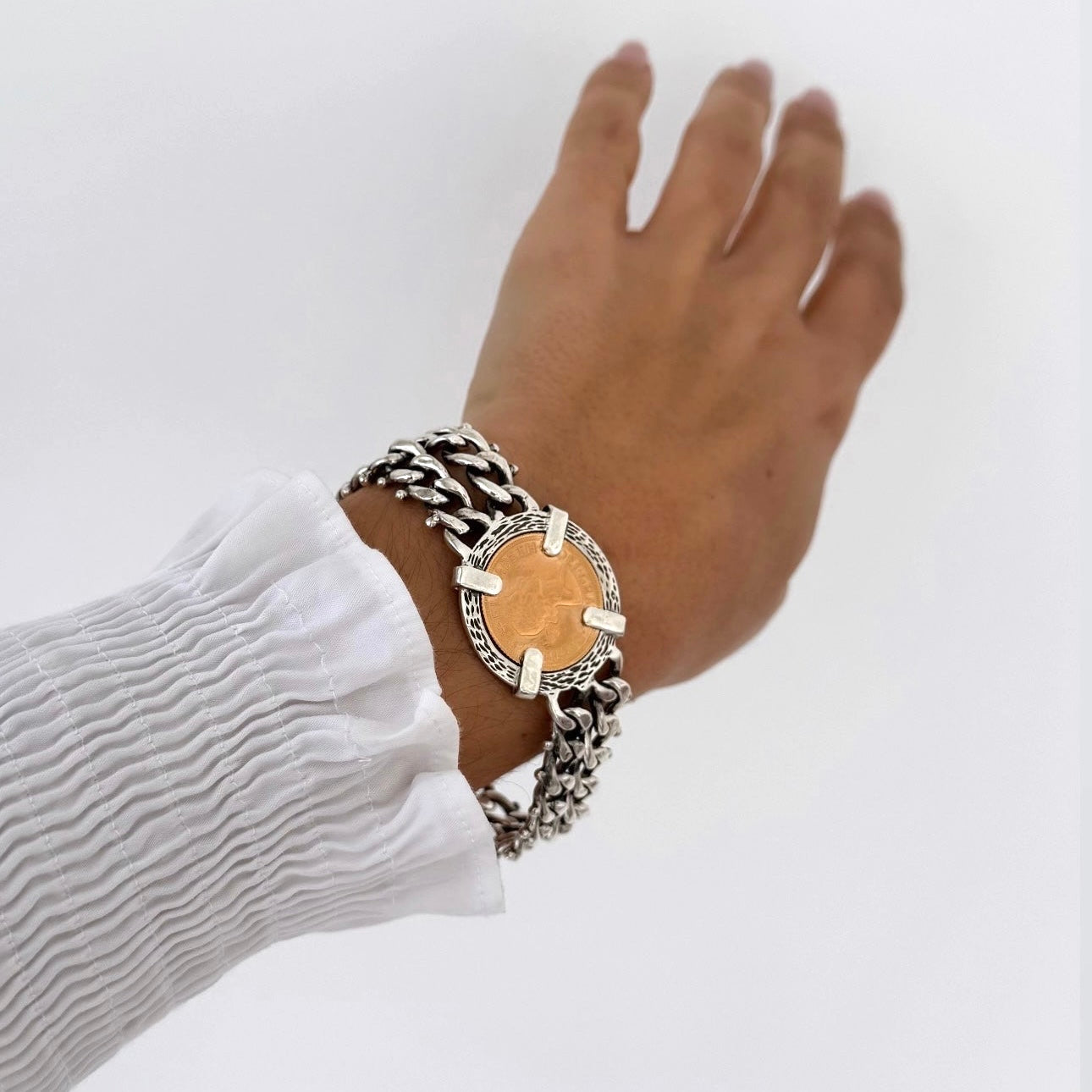 Pulseira com libra em prata